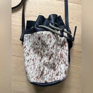 Eleven Thirty Shop Pony hair and Leather Drawstring Hobo Bag in Brown and Black